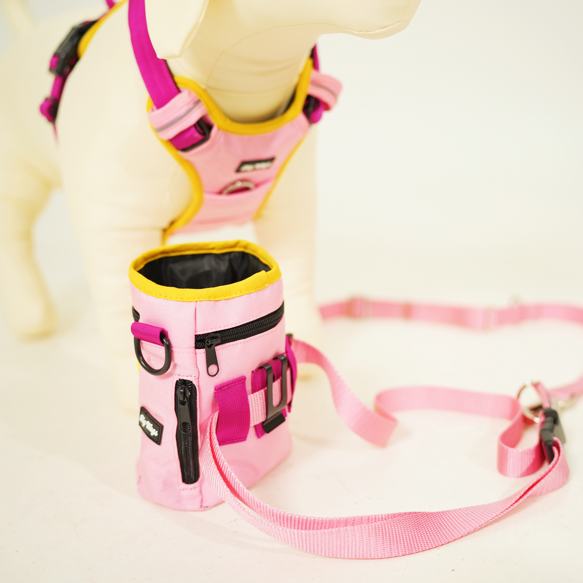 Big Wags Treat Pouch in pink and yellow with sling